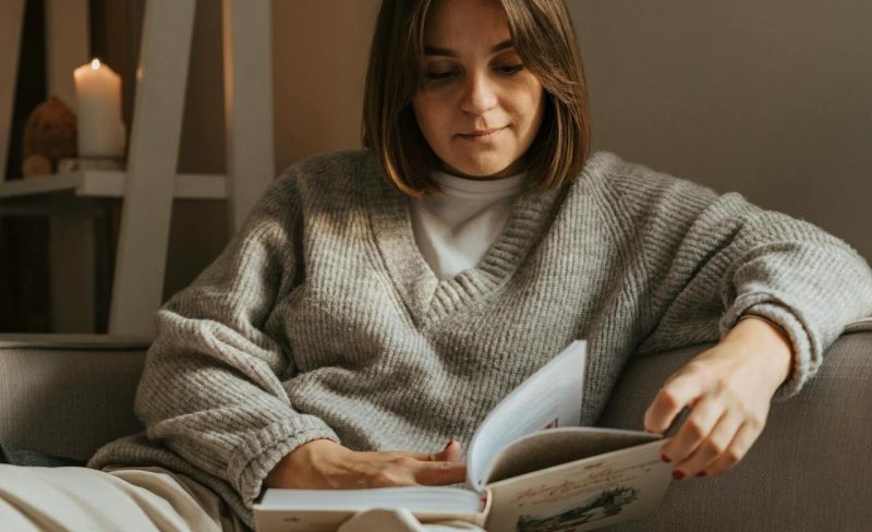 woman-reading-a-book-at-home
